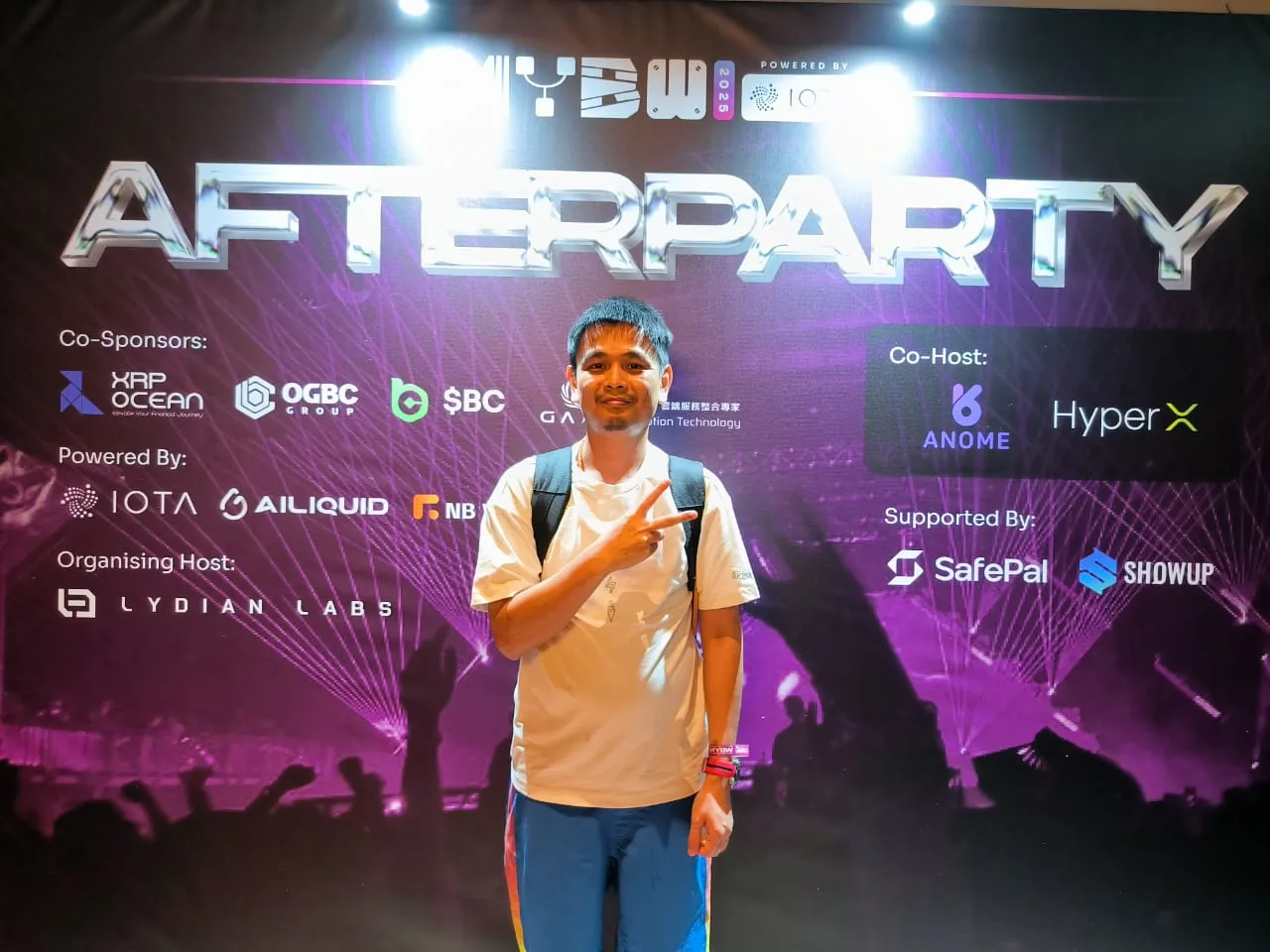 Hunter Ho at Web3 afterparty event backdrop