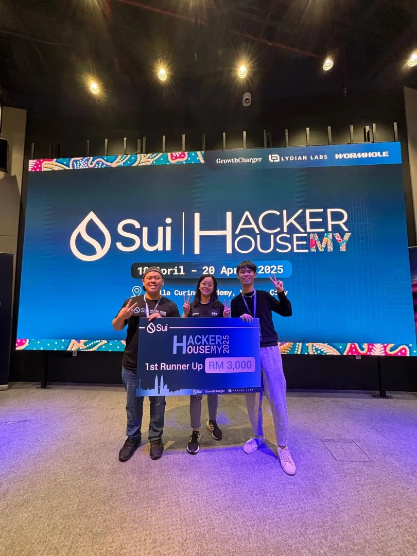Sui Hacker House team holding first runner up prize board