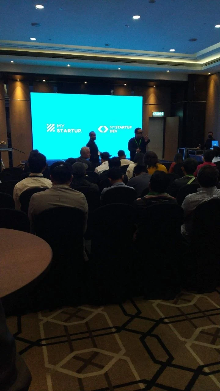 Audience seated during a MYStartup and MyStartup Dev stage session